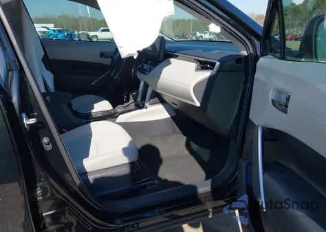 2023 Toyota Corolla Cross Le z USA, uszkodzony, nr VIN 7MUCAABG7PV070389